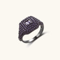 Bold adjustable ring with purple zirconia stones in dense pavé setting on dark gunmetal plated copper band